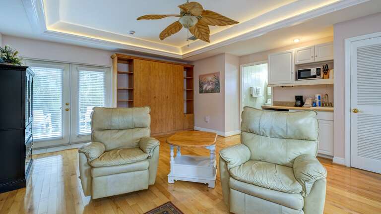 Spacious living area with recliner seating