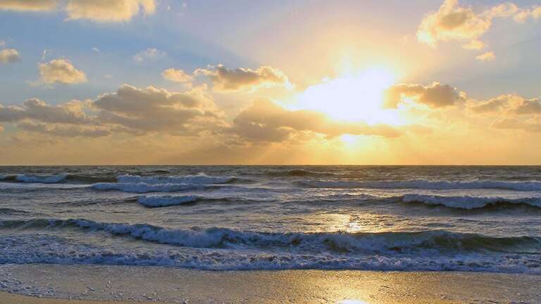 Stroll the beach to fantastic sunsets