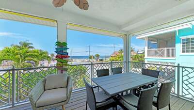 Screened in balcony with beach view