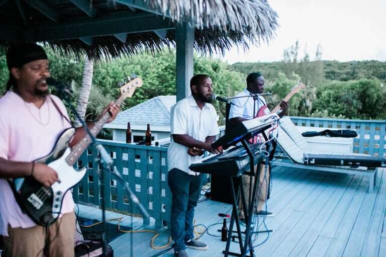 Band playing on Miss Ruby's pool deck.  (Photography by: Ryan Greenleaf Photography, wedding by Boy Meets Girl weddings.) Band playing on Miss Ruby's pool deck.  (Photography by: Ryan Greenleaf Photography, wedding by Boy Meets Girl weddings.)