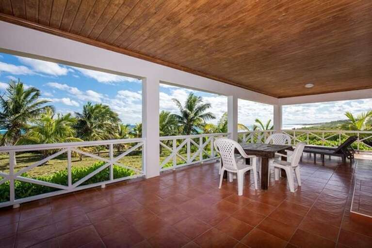 Lounge or dine on our deck and take in magnificent panoramic views of the ocean.