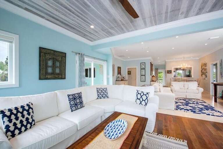Living Area has an open concept with 2 comfortable sofas surrounding a large screen TV with cable and WIFI in the family room. Living Area has an open concept with 2 comfortable sofas surrounding a large screen TV with cable and WIFI in the family room.