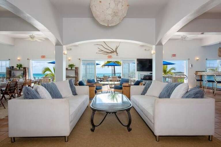 Lounge facing the patio and the beach.