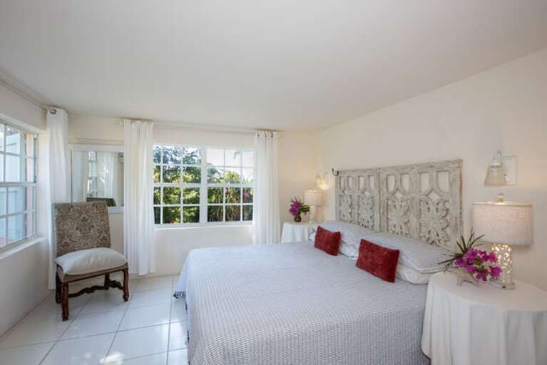 Bedroom Three with a king size bed.