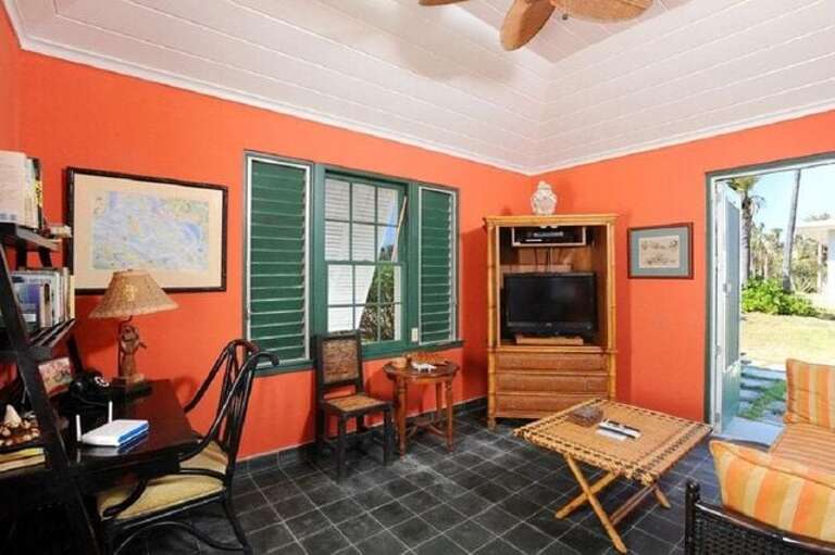 The den/TV room has a day bed and can serve as the fourth bedroom The den/TV room has a day bed and can serve as the fourth bedroom