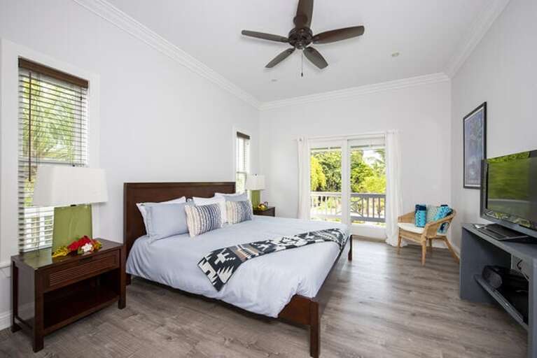 Master bedroom suite with doors to deck