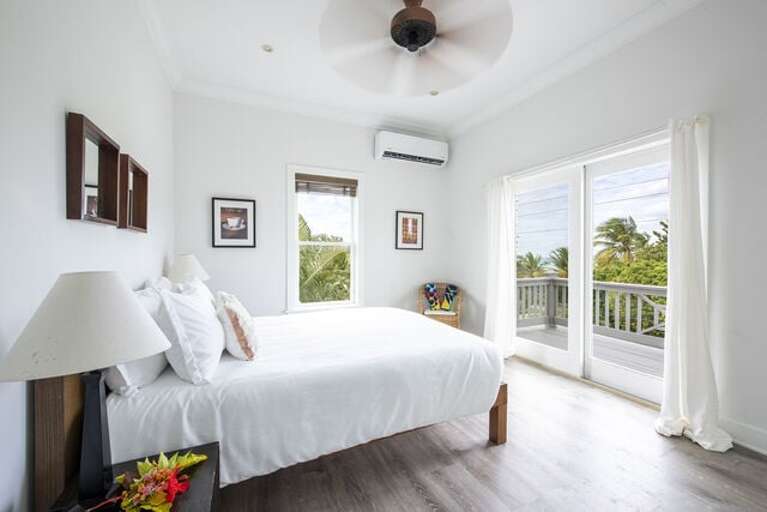 Queen Bedroom, second floor, with private balcony and ocean views