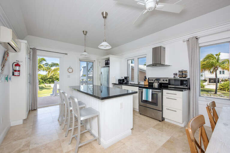 Kitchen with additional bar for seating