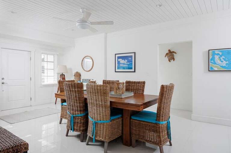 The dining area seats six at the table