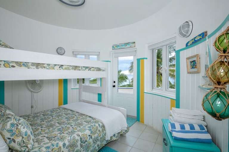 Third bedroom with an ocean view (new bunk bed, QUEEN bed on the bottom and a twin on top).