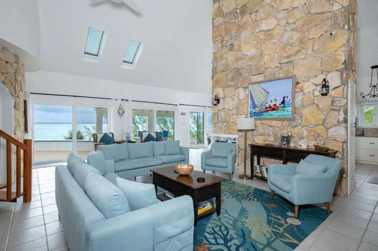 Great Room with spectacular ocean views and links with the expansive terrace over-looking the ocean below.