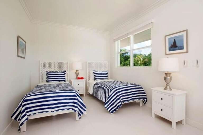 Studio apartment bedroom. Twins can convert to a king.