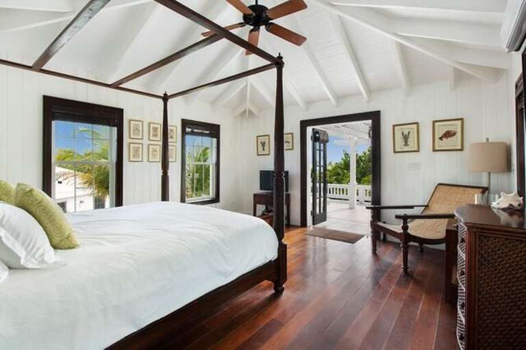 First Beach cottage bedroom suite with king bed, en suite bath, pool and ocean view
