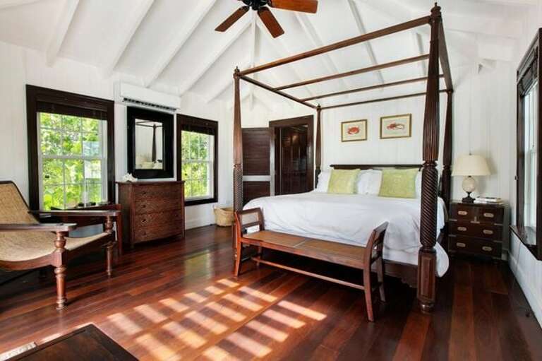 First Beach cottage bedroom suite with king bed, en suite bath, pool and ocean view