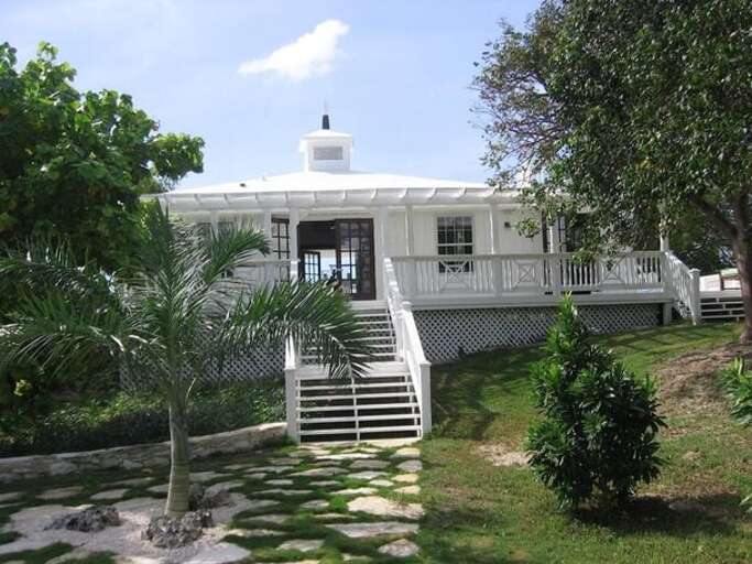The Great Hall exterior and wrap-around veranda.