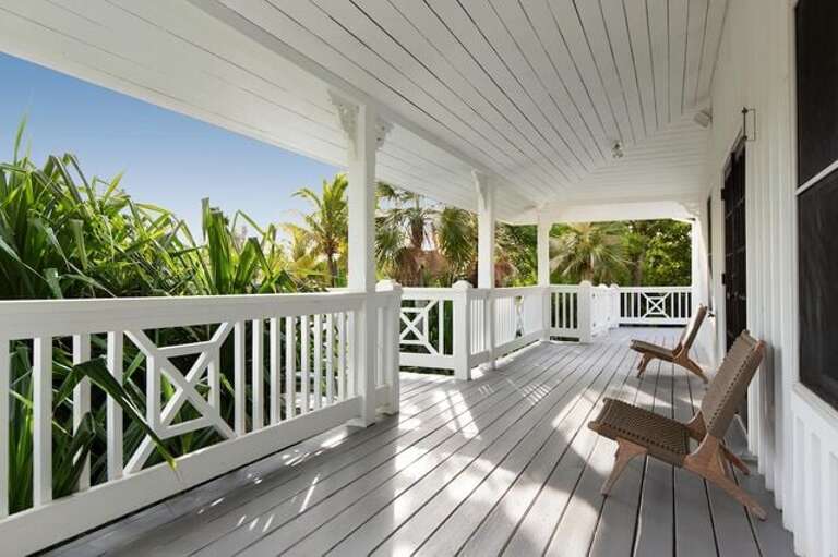 Great Hall veranda overlooking tennis court