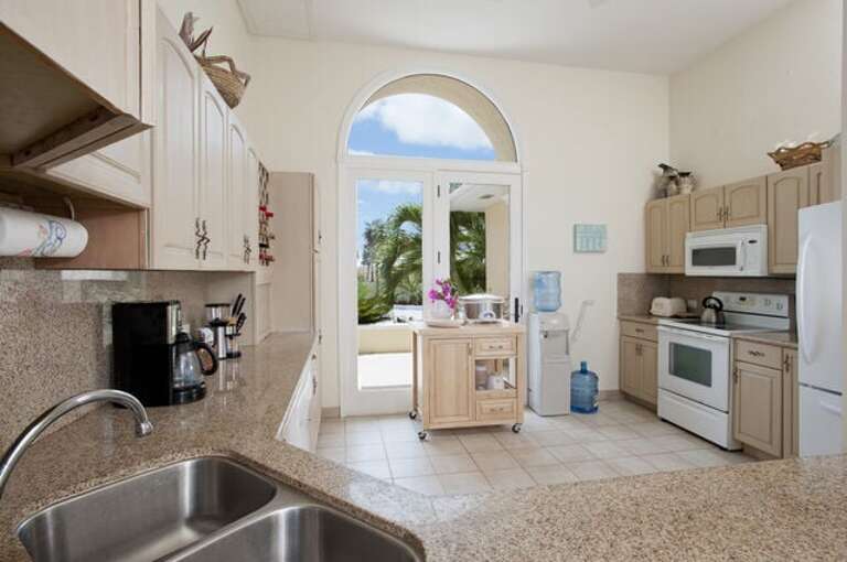 Kitchen with Ocean Views. Finished in granite and maple Kitchen with Ocean Views. Finished in granite and maple