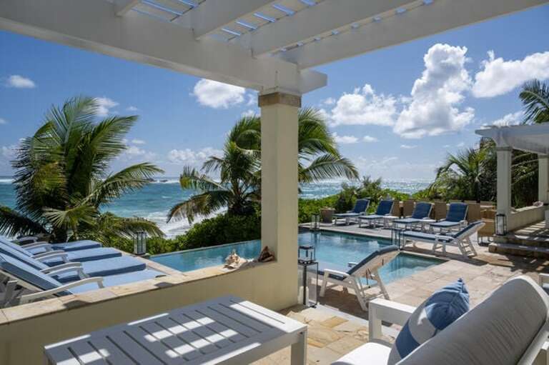 Covered patio and our new infinity heated pool.