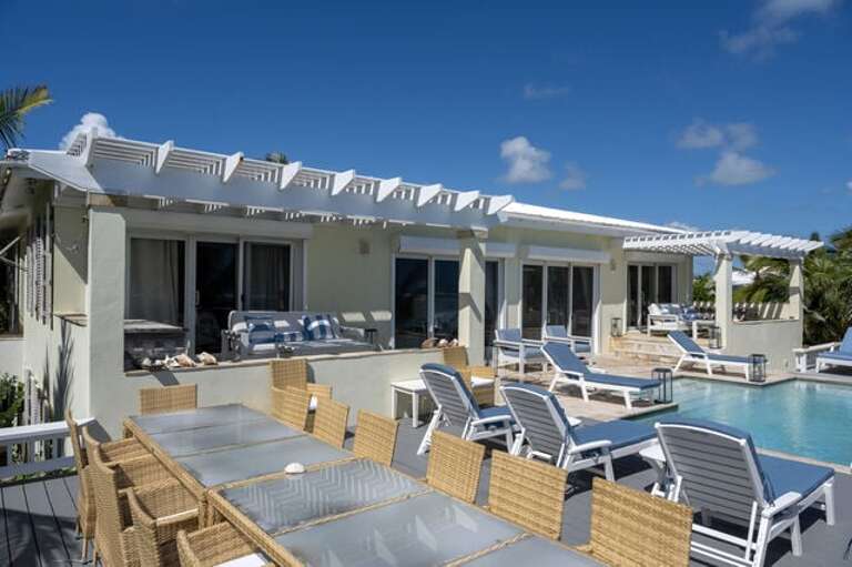 If you wish to dine outside, there is a convenient deck situated just outside the kitchen's sliding