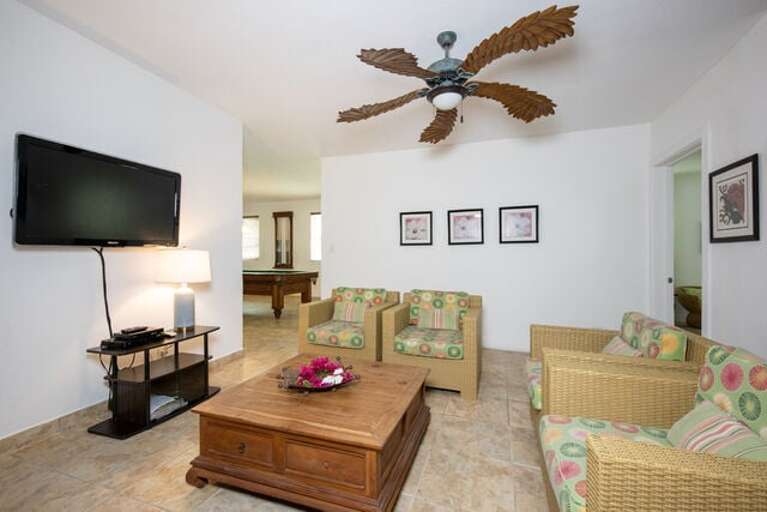 Downstairs living room (features flat screen TV).