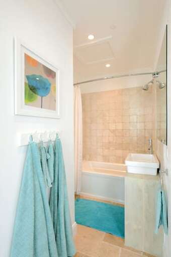 Guest bath with tumbled marble and travertine floor.