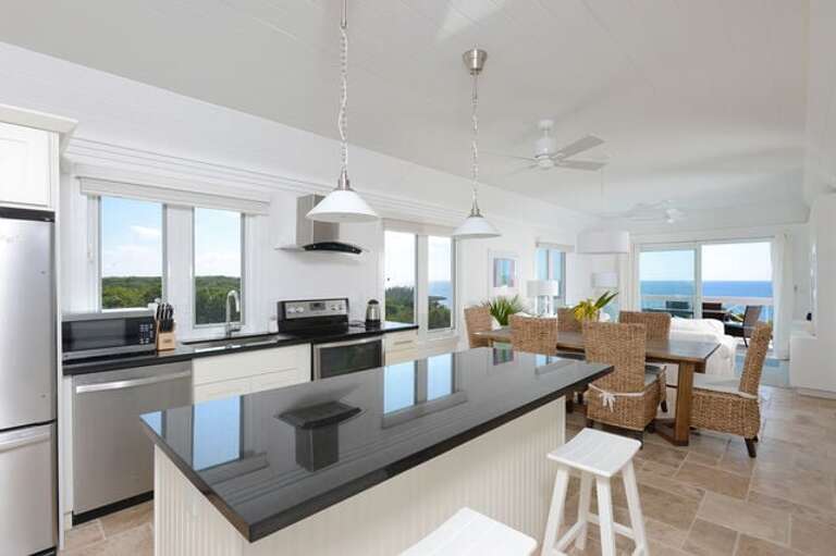 Kitchen and dining area with phenomenal ocean views