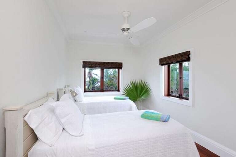 Upstairs bedroom with ocean views.  One of two upstairs bedrooms with twin beds.