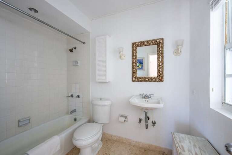 Bath with tub/shower combination.