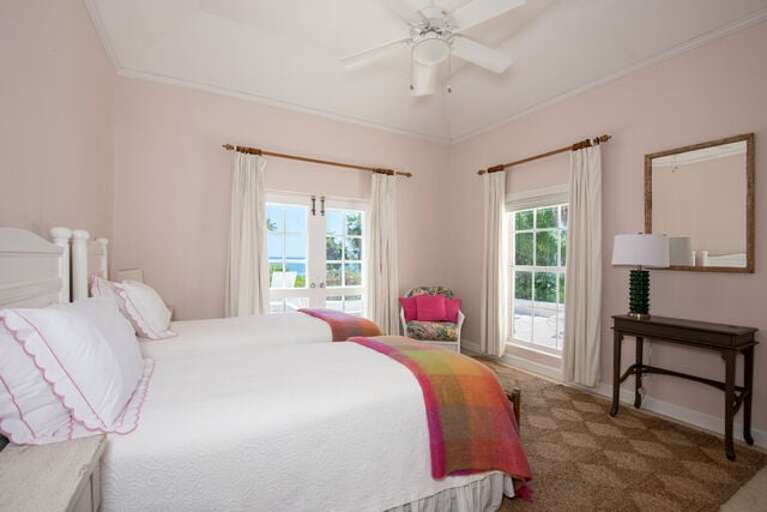 Guest bedroom suite. The twin beds can be converted to a king. Every bedroom has an en suite bath.
