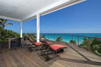 Covered porch dining and lounging
