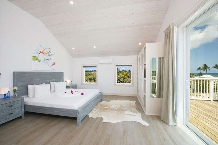 First King bedroom suite, with an enormous private deck and a luxuriously appointed full bath.