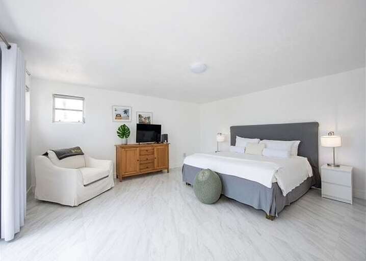 Bungalow master bedroom suite.  The 2 bungalows, separate from the main building for privacy, consist of identical master suites.