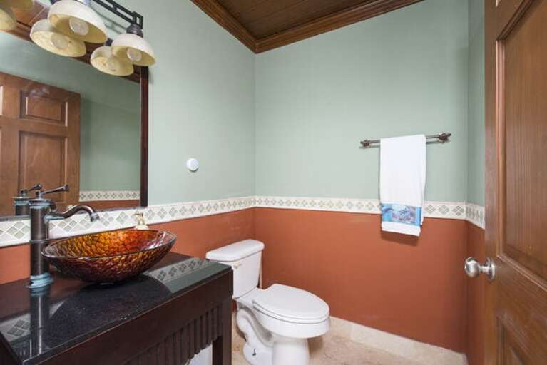 A half bath is located between the kitchen and the main living room.