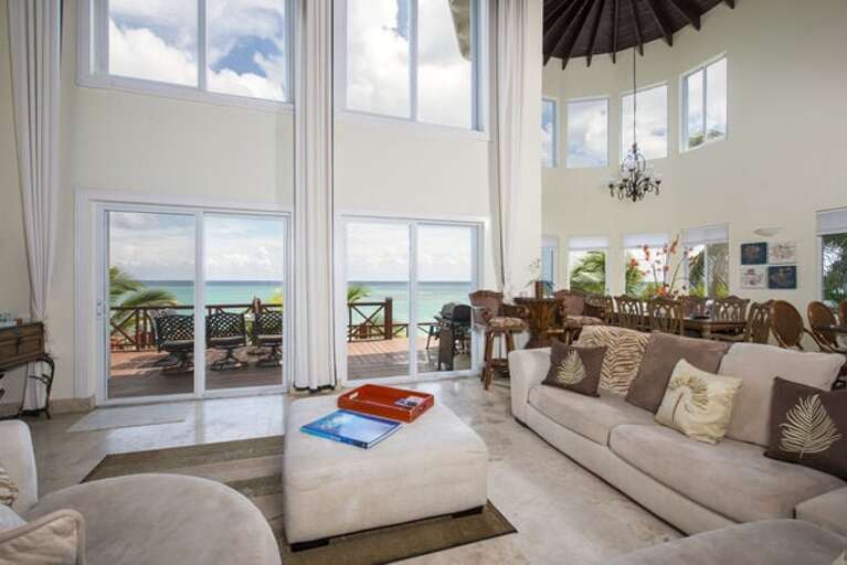 Palisades' grand bay windows provide a 50-mile, 180-degree view of the turquoise ocean and pink sands below.