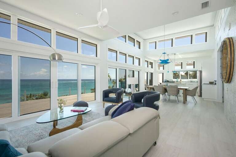 Great room with Italian leather sofa looking toward the Dining Area