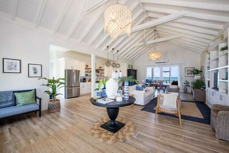 Great room with stunning ocean views.  Lots of space for lounging in the main room and enjoying family time.