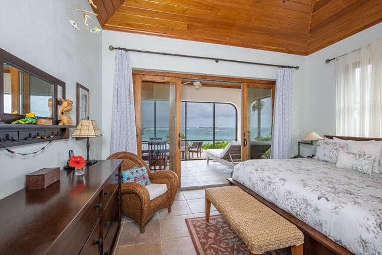 Master Bedroom with chaise lounge on screen porch