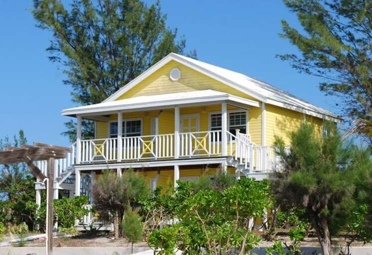 The Yellow Building with four rooms, two king bedrooms upstairs and 1 double room and 1 king/single room downstairs.  Every room has an en-suite bath and an ocean view. The Yellow Building with four rooms, two king bedrooms upstairs and 1 double room and 1 king/single room downstairs.  Every room has an en-suite bath and an ocean view.