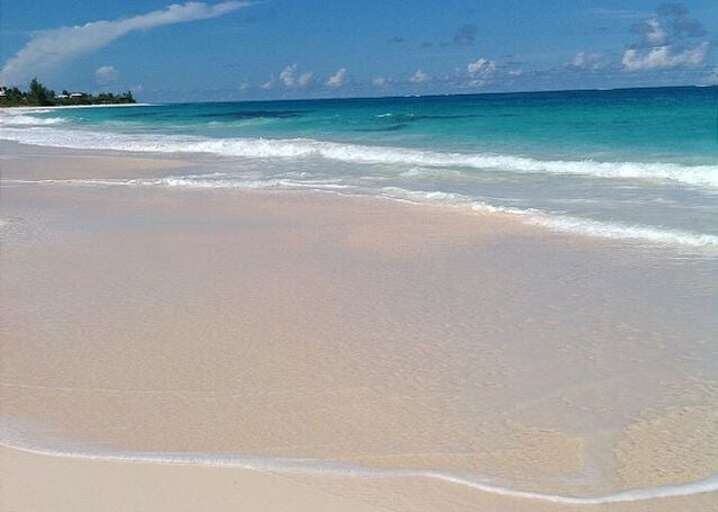 On the beachfront encompassed by the ocean all around On the beachfront encompassed by the ocean all around