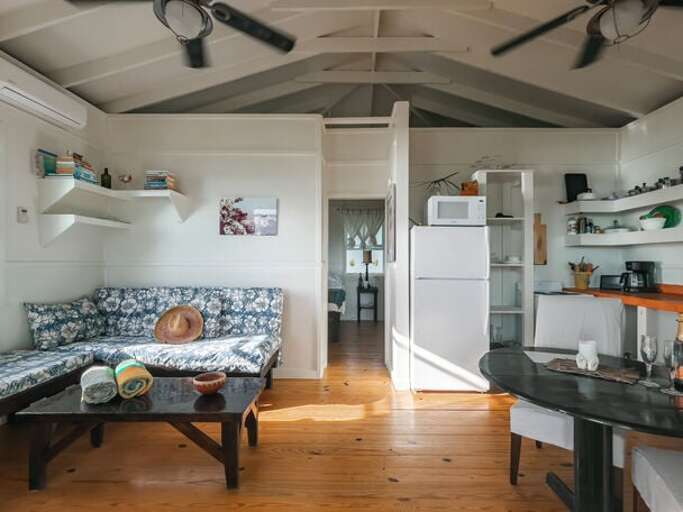 Living area looking into bedroom Living area looking into bedroom
