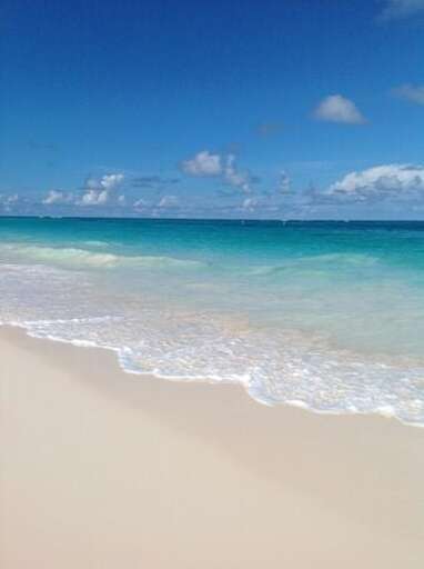 Step onto the soft pink sand and into the warm turquoise water! Step onto the soft pink sand and into the warm turquoise water!