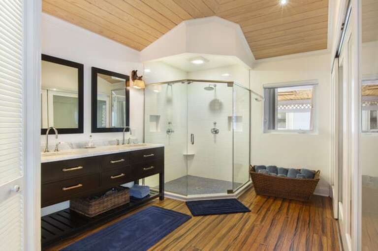Ensuite bathrooms with walk-in shower in the main house.