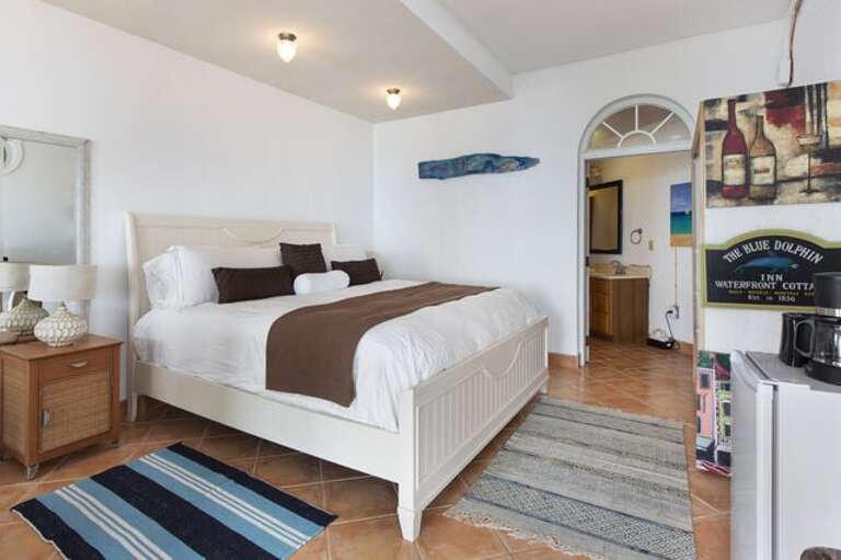 The Gazebo Suite bedroom with king size bed and en suite bath.