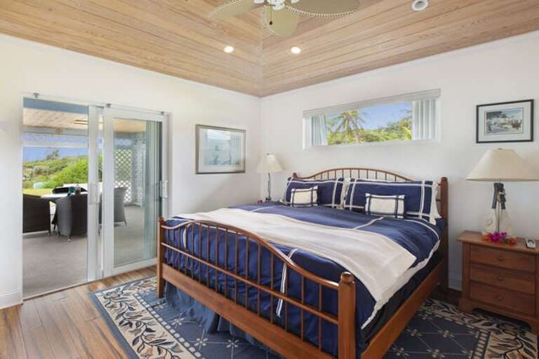 Second of two Main House master bedroom suites with king bed and ensuite bath with walk-in shower