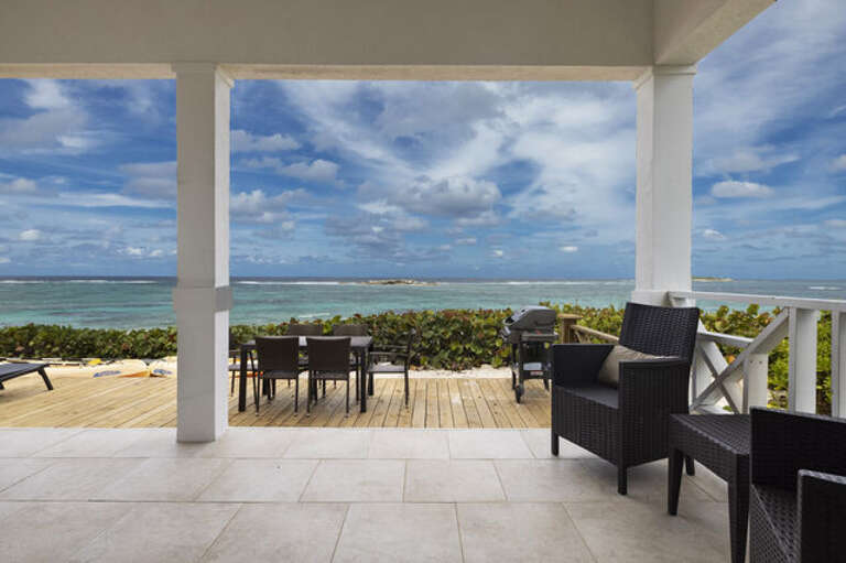 Patio overlooking the beach and ocean.
