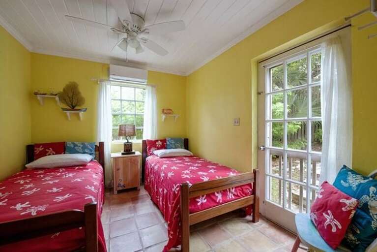 Bedroom with two twins and garden view. Bedroom with two twins and garden view.