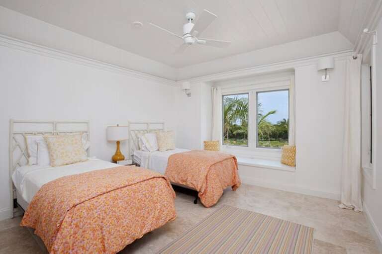 Guest suite with big Atlantic Ocean view, window seat and balcony.