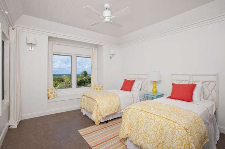Guest suite with big Atlantic Ocean view, window seat and balcony.