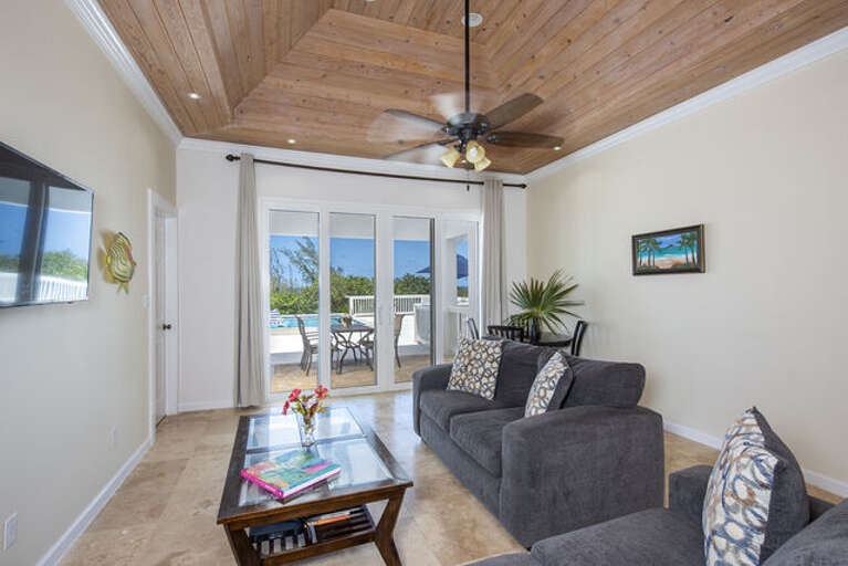 The living areas have sweeping views of the sea and open onto the pool deck.