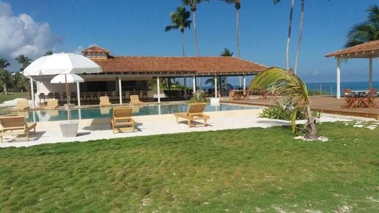 La Bougainvillea's pool bar and the outdoor section of the restaurant, 100 yards from Wild Orchid house.